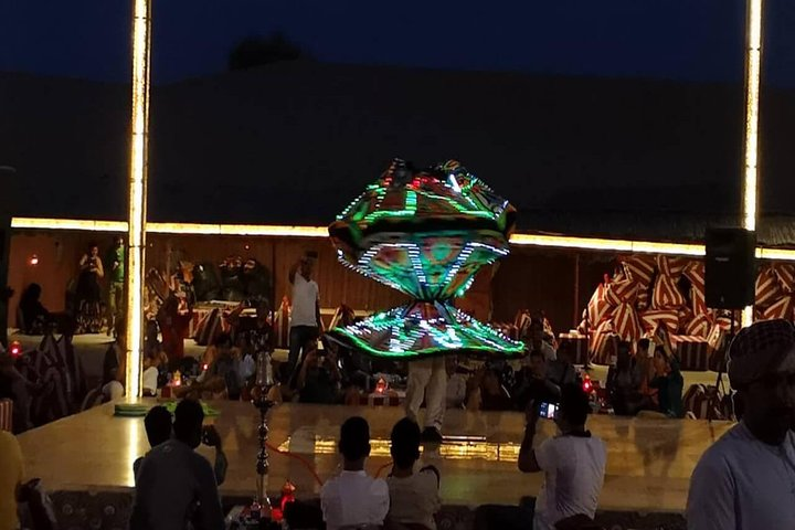 Experience the rich culture of desert life with mesmerizing dance performances delicious BBQ under the stars and the thrill of dune bashing in Ras Al Khaimah's serene landscapes.